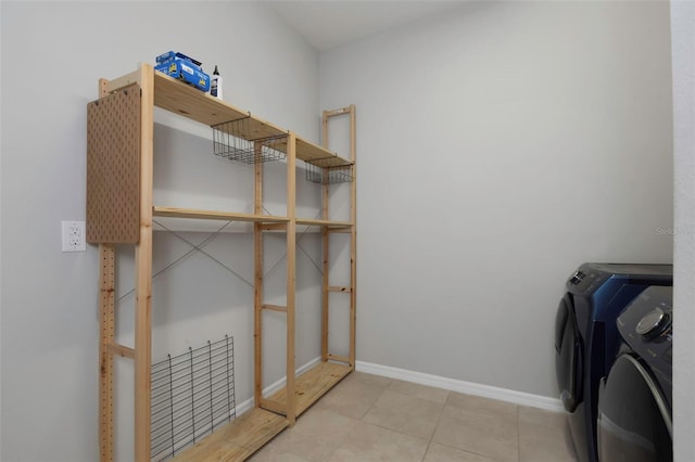 1613 Cabbage Key Dr, Ruskin, FL 33570 - washroom with washer and dryer and tile patterned flooring