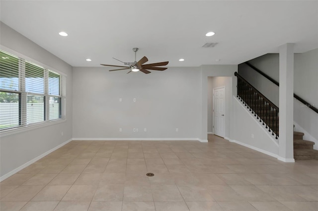1613 Cabbage Key Dr, Ruskin, FL 33570 - spare room featuring a ceiling fan, stairs, recessed lighting, and light tile patterned floors