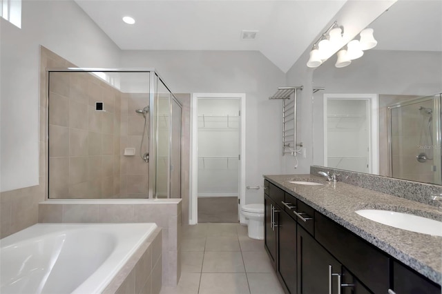 1613 Cabbage Key Dr, Ruskin, FL 33570 - full bathroom with a spacious closet, a stall shower, double vanity, a garden tub, and tile patterned flooring