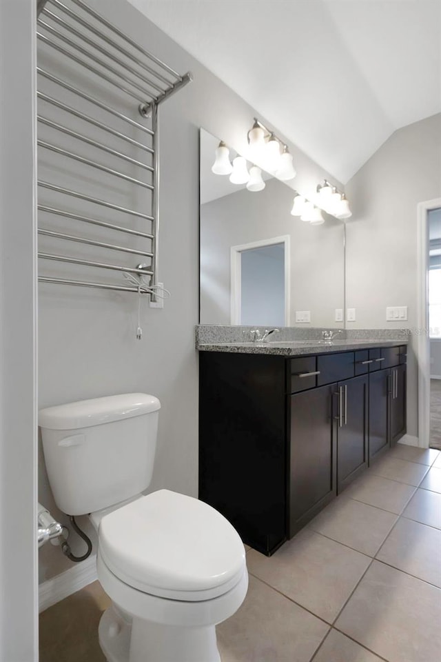 1613 Cabbage Key Dr, Ruskin, FL 33570 - bathroom with lofted ceiling, vanity, and tile patterned flooring