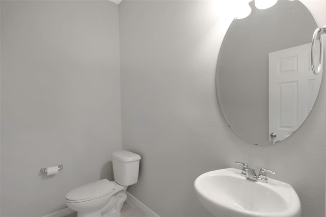 1613 Cabbage Key Dr, Ruskin, FL 33570 - half bath featuring a sink and tile patterned flooring