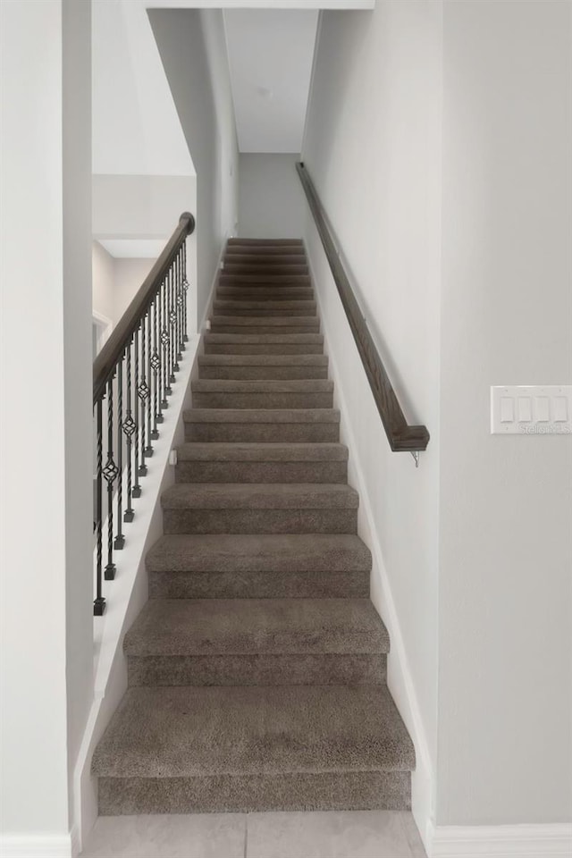 1613 Cabbage Key Dr, Ruskin, FL 33570 - staircase featuring baseboards
