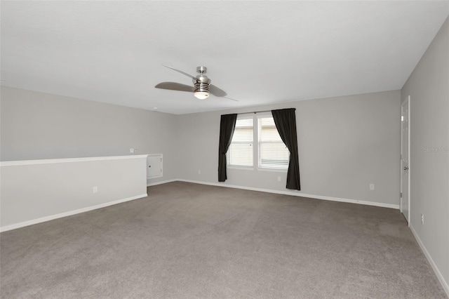 1613 Cabbage Key Dr, Ruskin, FL 33570 - unfurnished room featuring a ceiling fan and dark colored carpet