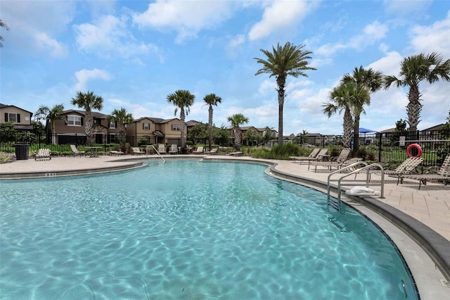 1613 Cabbage Key Dr, Ruskin, FL 33570 - community pool with a residential view and a patio