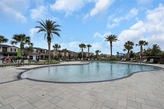 1613 Cabbage Key Dr, Ruskin, FL 33570 - community pool featuring a residential view and a patio area