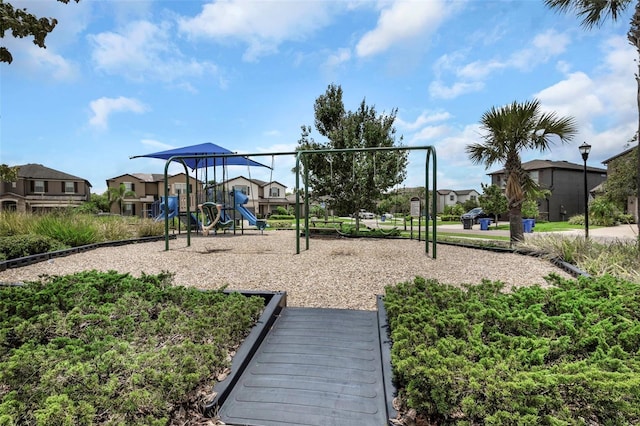 1613 Cabbage Key Dr, Ruskin, FL 33570 - community jungle gym with a residential view