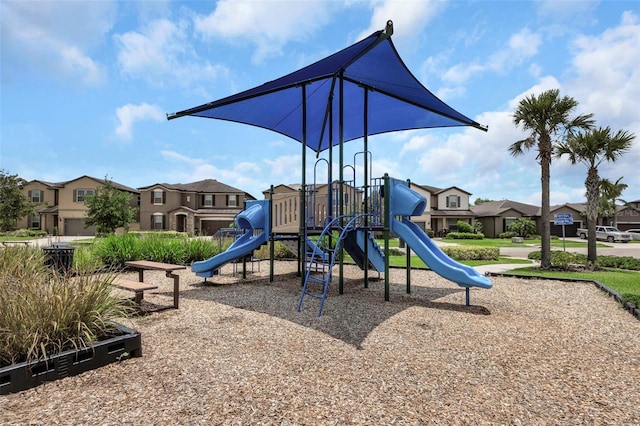 1613 Cabbage Key Dr, Ruskin, FL 33570 - community jungle gym with a residential view