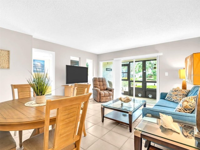 401 Windrush Bay Dr, Tarpon Springs, FL 34689 - living area featuring a textured ceiling and light tile patterned floors