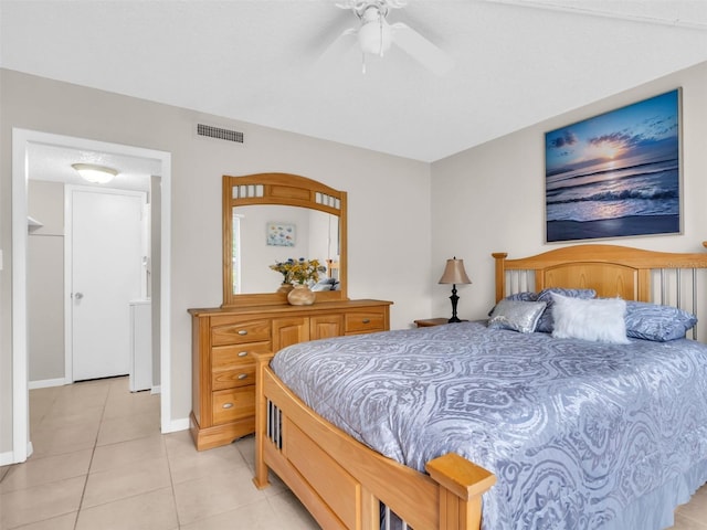 401 Windrush Bay Dr, Tarpon Springs, FL 34689 - bedroom with light tile patterned flooring and a ceiling fan