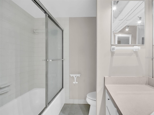 401 Windrush Bay Dr, Tarpon Springs, FL 34689 - full bathroom with tile patterned floors, vanity, and enclosed tub / shower combo