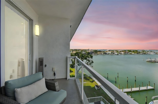 415 Island Way Unit 507, Clearwater Beach, FL 33767 - balcony at dusk featuring a water view