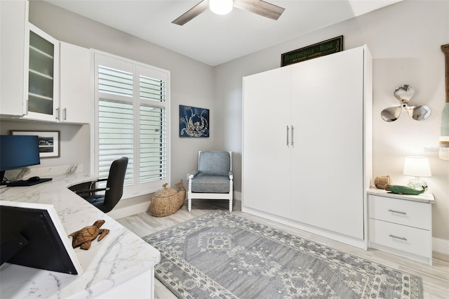 415 Island Way Unit 507, Clearwater Beach, FL 33767 - home office with a ceiling fan and light wood-style floors