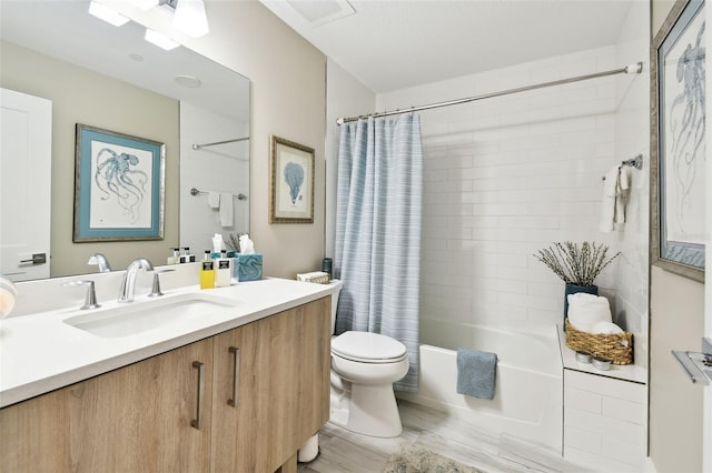 415 Island Way Unit 507, Clearwater Beach, FL 33767 - bathroom featuring vanity, shower / tub combo with curtain, and wood finished floors