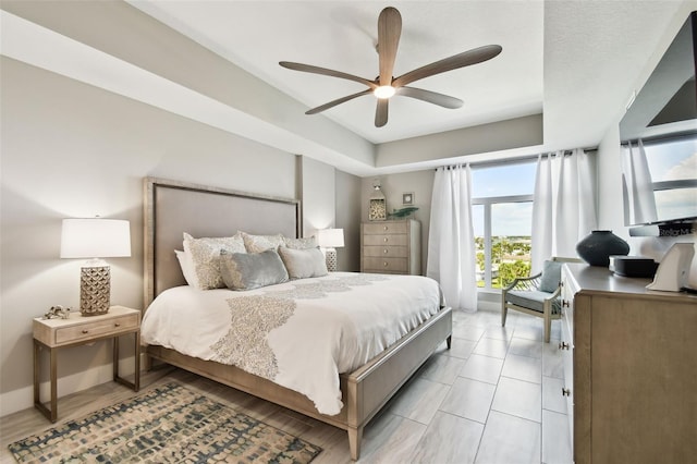 415 Island Way Unit 507, Clearwater Beach, FL 33767 - bedroom featuring a tray ceiling and ceiling fan