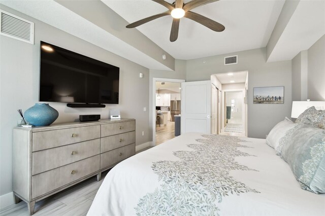 415 Island Way Unit 507, Clearwater Beach, FL 33767 - bedroom featuring ensuite bath and ceiling fan