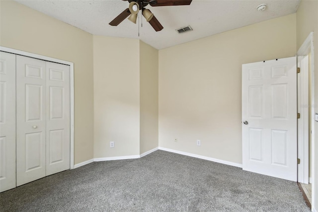 297 Beacon Pointe Dr, Ocoee, FL 34761 - unfurnished bedroom with carpet floors, a closet, and ceiling fan