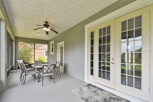 297 Beacon Pointe Dr, Ocoee, FL 34761 - sunroom / solarium featuring french doors