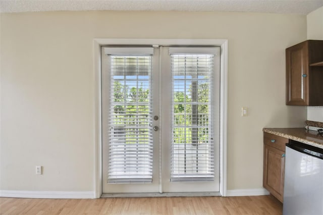 297 Beacon Pointe Dr, Ocoee, FL 34761 - doorway with light wood-style floors