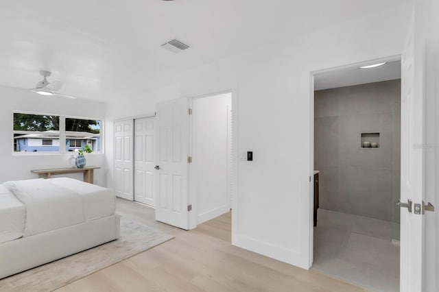 3381 19th Pl SW, Largo, FL 33774 - bedroom with wood finished floors and a closet