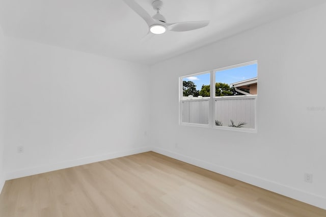 3381 19th Pl SW, Largo, FL 33774 - spare room featuring wood finished floors and a ceiling fan