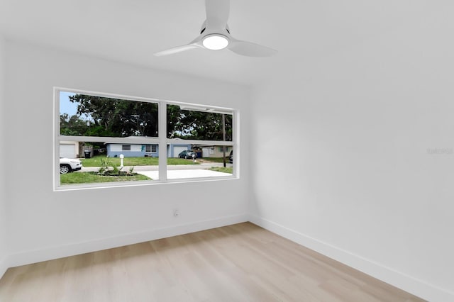 3381 19th Pl SW, Largo, FL 33774 - spare room with wood finished floors and a ceiling fan