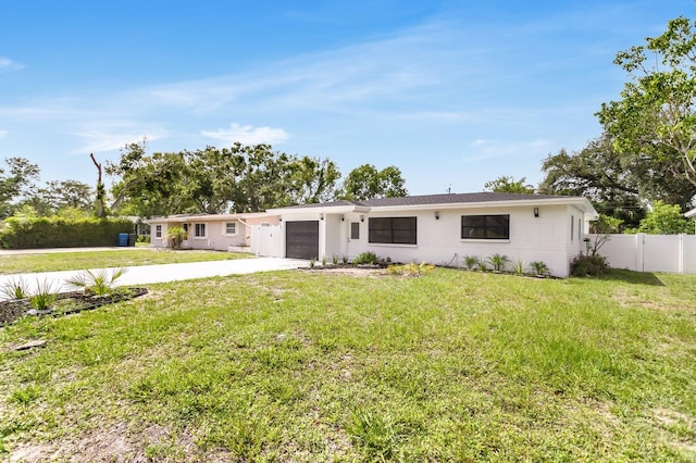 3381 19th Pl SW, Largo, FL 33774 - ranch-style house with concrete driveway and an attached garage