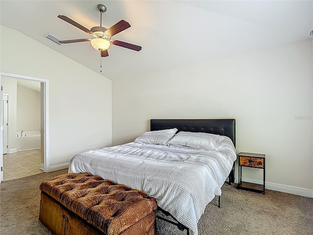 14371 Edinburgh Moor Dr, Wimauma, FL 33598 - carpeted bedroom with vaulted ceiling and ceiling fan