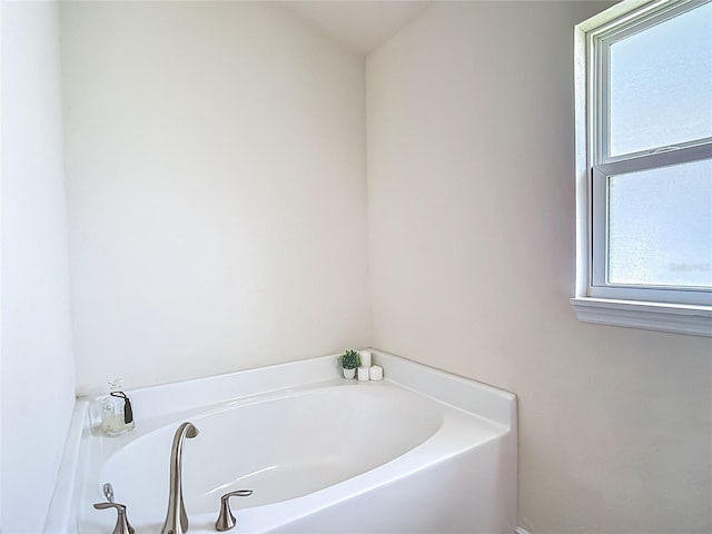 14371 Edinburgh Moor Dr, Wimauma, FL 33598 - full bathroom with plenty of natural light and a garden tub