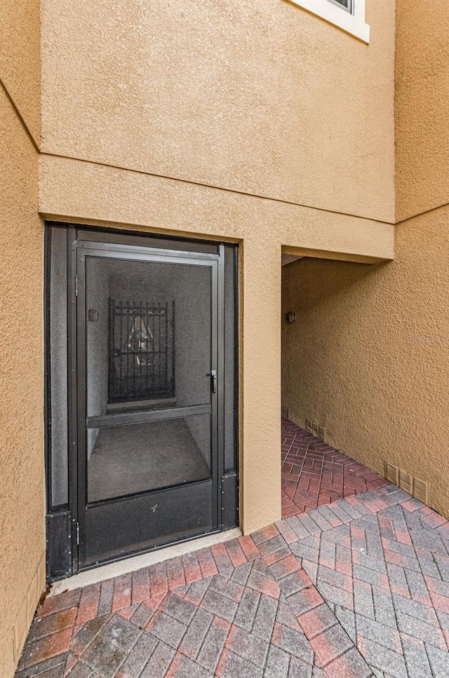 5030 Herring Ct, New Port Richey, FL 34652 - exterior view of stucco siding