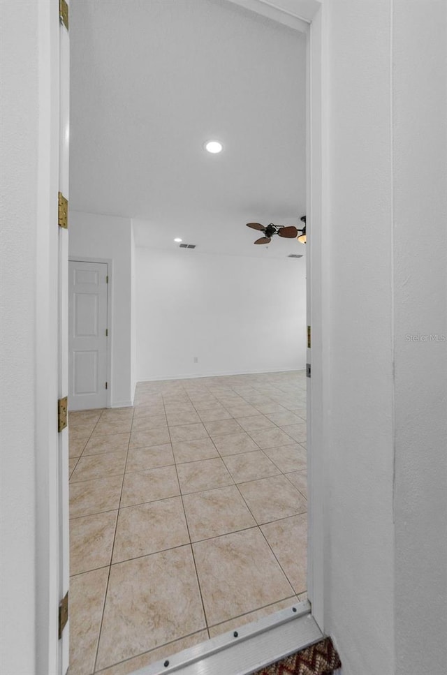 5030 Herring Ct, New Port Richey, FL 34652 - corridor with recessed lighting and tile patterned floors