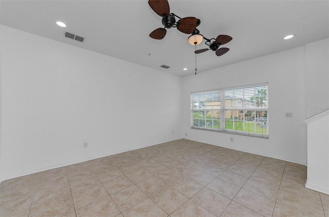 5030 Herring Ct, New Port Richey, FL 34652 - unfurnished room with recessed lighting, ceiling fan, and light tile patterned floors