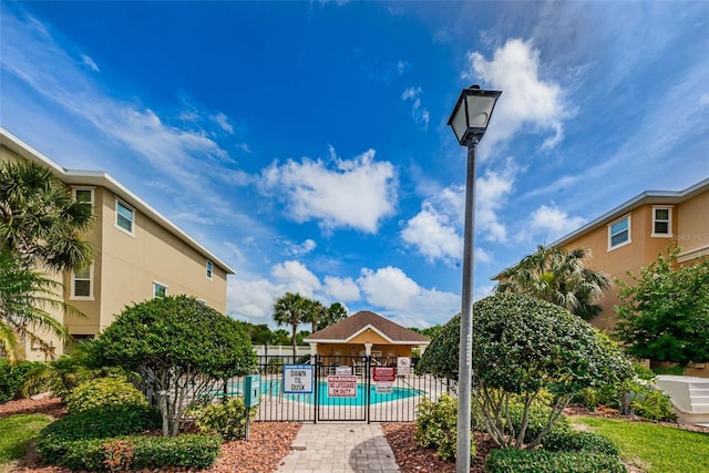 5030 Herring Ct, New Port Richey, FL 34652 - community pool featuring a gazebo