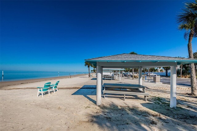 5030 Herring Ct, New Port Richey, FL 34652 - surrounding community featuring a gazebo and view of water and beach