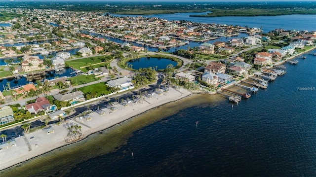 5030 Herring Ct, New Port Richey, FL 34652 - aerial overview of property's location featuring a large body of water and nearby suburban area