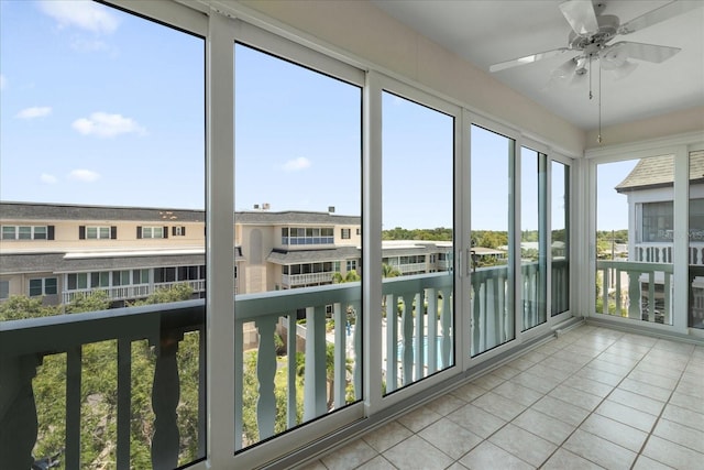 139 Bluff View Dr Unit 405, Belleair Bluffs, FL 33770 - unfurnished sunroom featuring tile patterned flooring