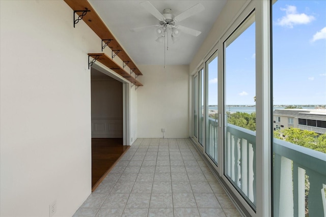 139 Bluff View Dr Unit 405, Belleair Bluffs, FL 33770 - unfurnished sunroom with a water view