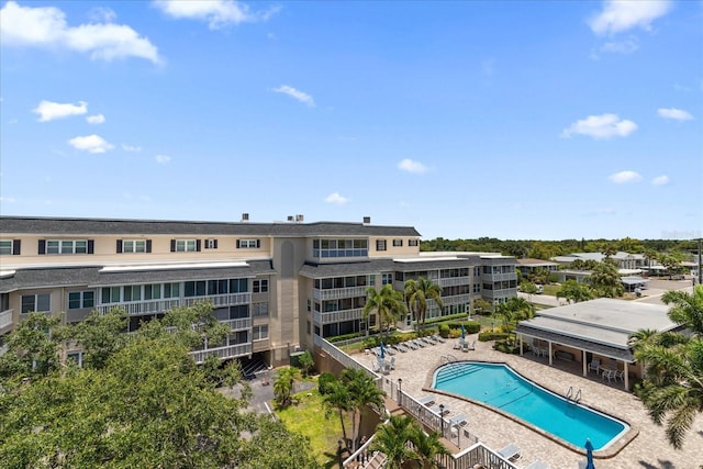 139 Bluff View Dr Unit 405, Belleair Bluffs, FL 33770 - community pool featuring a patio