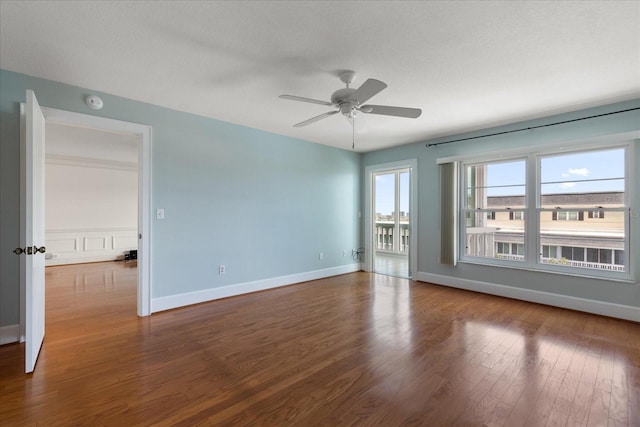 139 Bluff View Dr Unit 405, Belleair Bluffs, FL 33770 - unfurnished room with wood finished floors, a ceiling fan, and a smoke detector