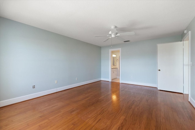 139 Bluff View Dr Unit 405, Belleair Bluffs, FL 33770 - unfurnished room featuring ceiling fan and wood finished floors