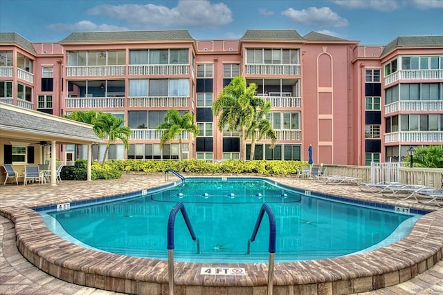139 Bluff View Dr Unit 405, Belleair Bluffs, FL 33770 - community pool with a patio and a ceiling fan