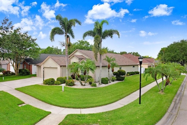 7101 Bucks Ford Dr, Riverview, FL 33578 - single story home with concrete driveway, a garage, stucco siding, and a front yard