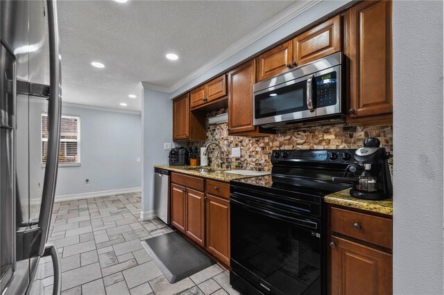5346 Black Pine Dr, Tampa, FL 33624 - kitchen featuring appliances with stainless steel finishes, ornamental molding, tasteful backsplash, light stone counters, and a textured ceiling