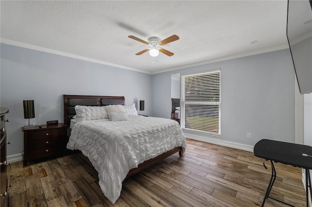 5346 Black Pine Dr, Tampa, FL 33624 - bedroom with wood-type flooring, ornamental molding, ceiling fan, and a textured ceiling