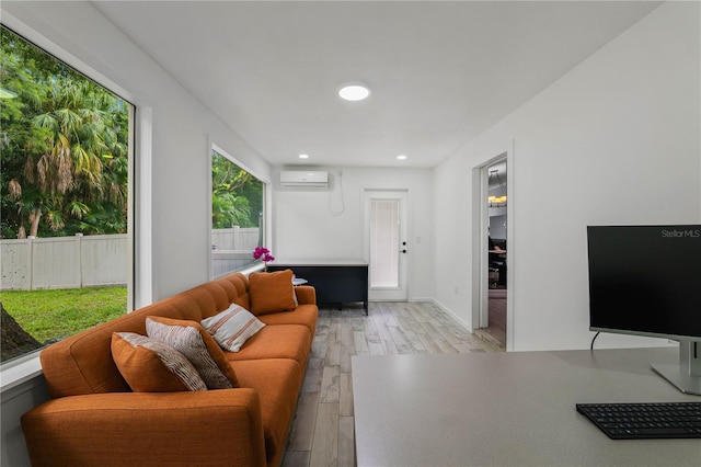 5346 Black Pine Dr, Tampa, FL 33624 - living room featuring an AC wall unit, light wood finished floors, and recessed lighting