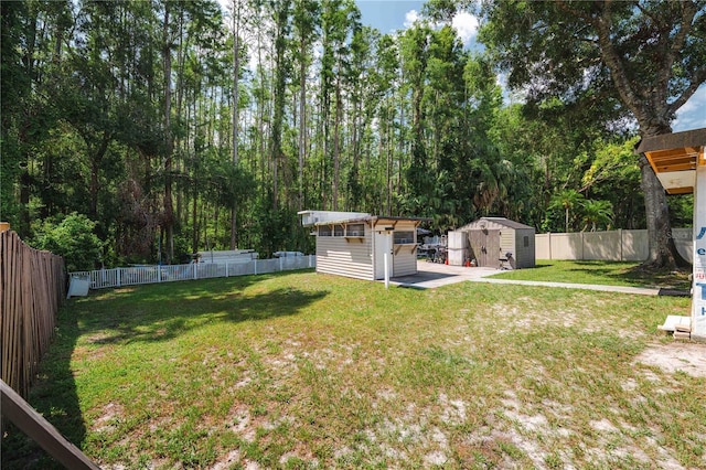 5346 Black Pine Dr, Tampa, FL 33624 - fenced backyard featuring a storage unit