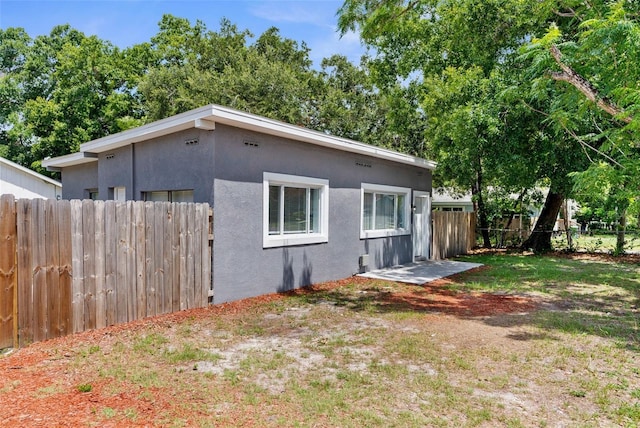 9310 N 12th St, Tampa, FL 33612 - back of property with stucco siding