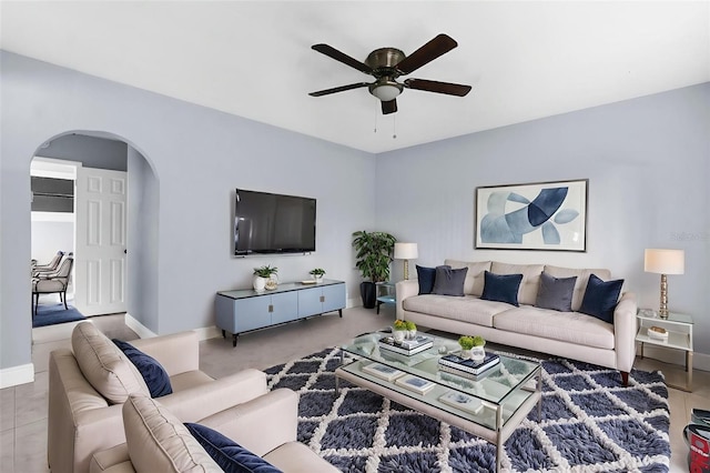 9310 N 12th St, Tampa, FL 33612 - living room with a ceiling fan and arched walkways