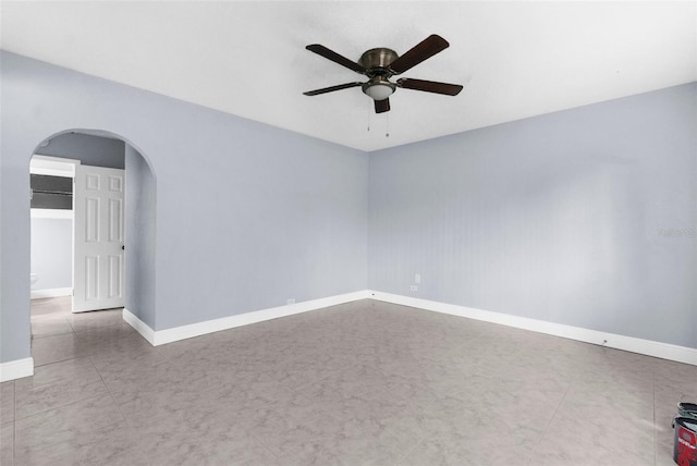 9310 N 12th St, Tampa, FL 33612 - unfurnished room with a ceiling fan and arched walkways