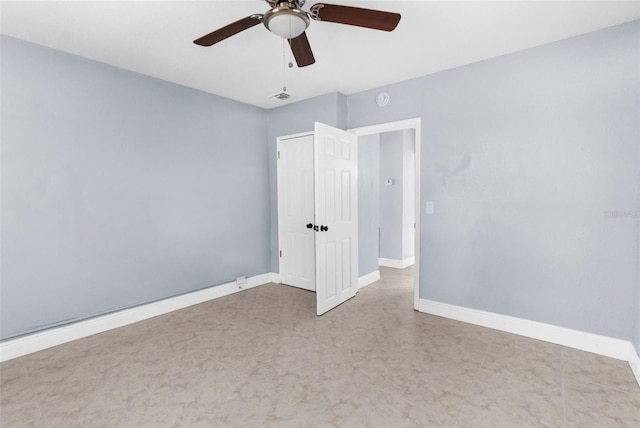 9310 N 12th St, Tampa, FL 33612 - unfurnished room with a ceiling fan and a smoke detector