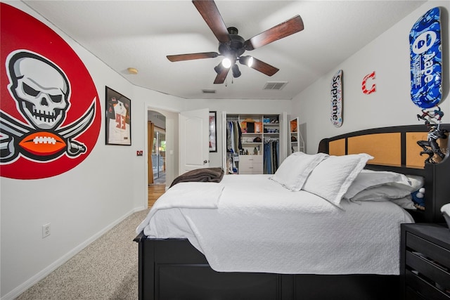 4512 Pointe O Woods Dr, Wesley Chapel, FL 33543 - bedroom with carpet flooring, a closet, and a ceiling fan